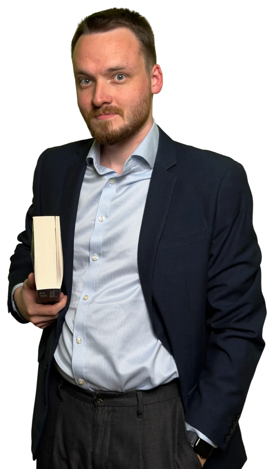 Anthony in a navy blazer holding a thick book under his arm