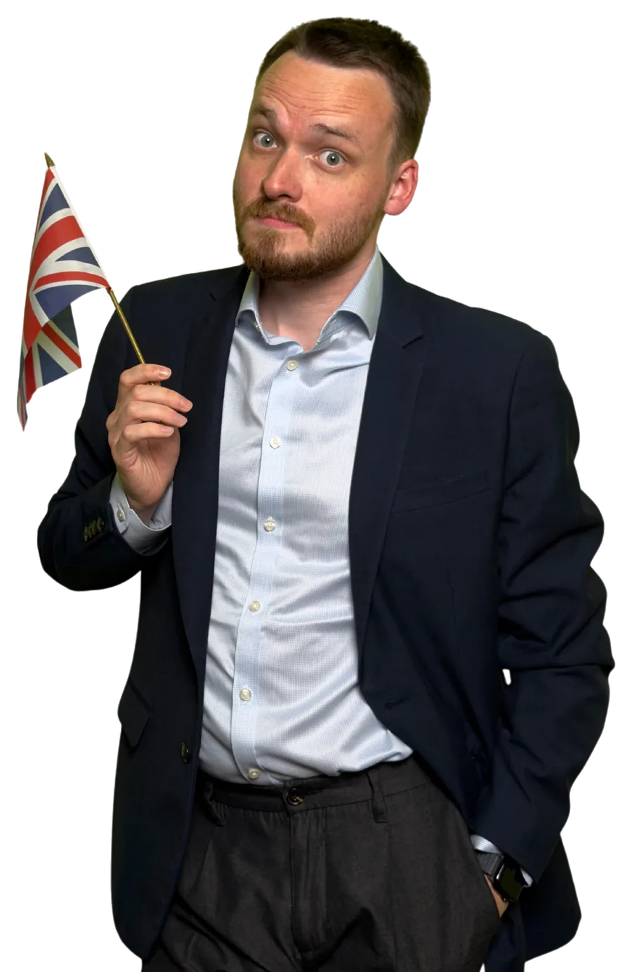 Anthony in a navy blazer, raising an eyebrow and waving a small Union Jack